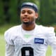 Seattle Seahawks cornerback Coby Bryant (8) jogs to the locker room following minicamp practice at the Virginia Mason Athletic Center Field